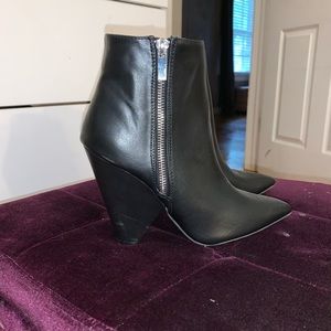 Unique heeled booties